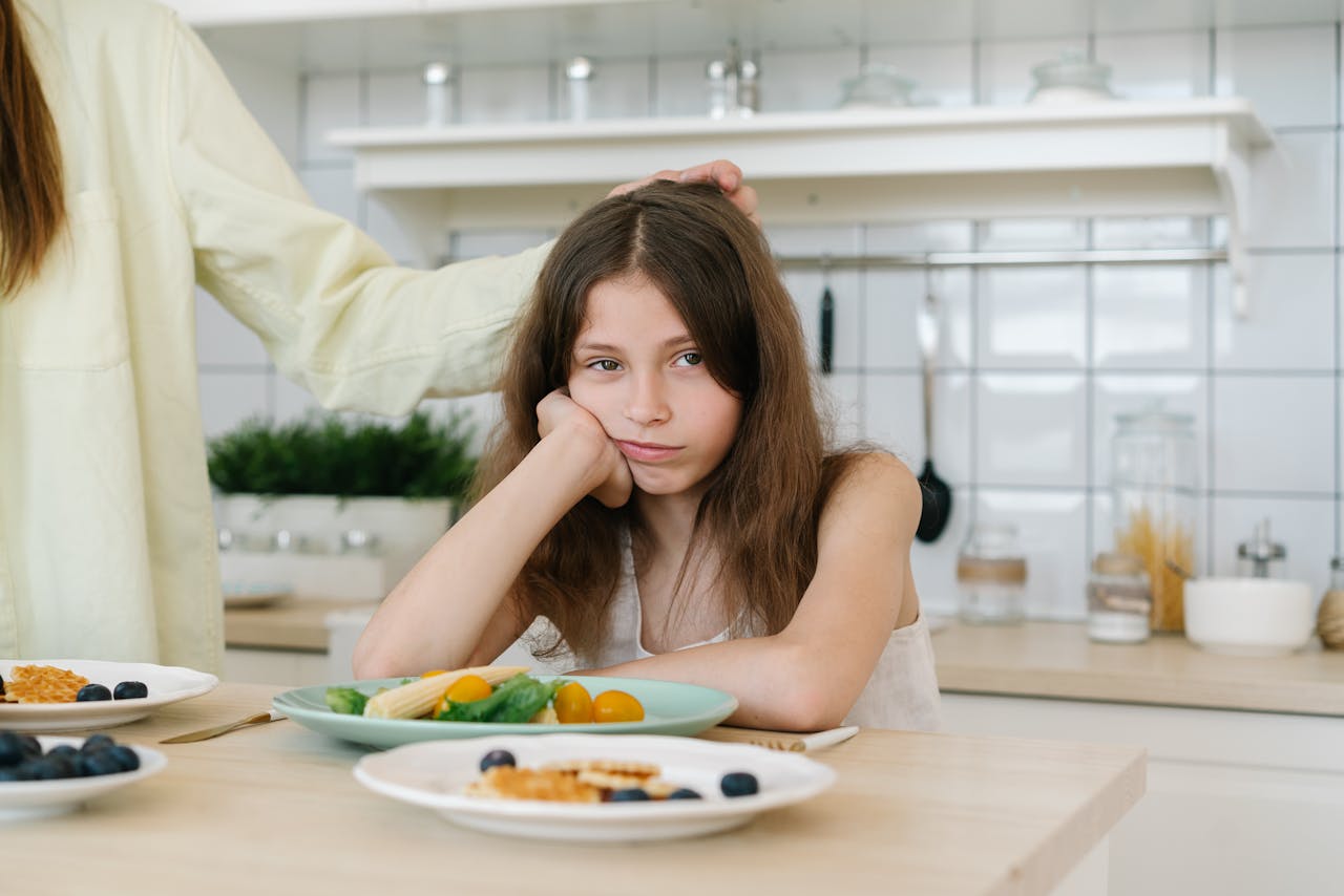 Young girl upset at her mom